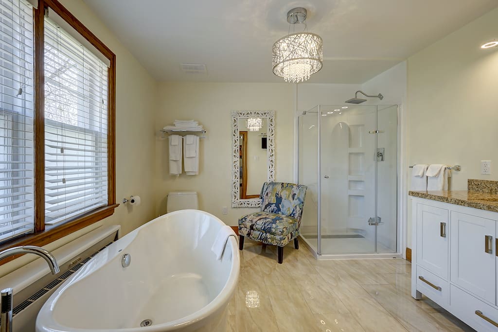 Luxury soaker tub with separate shower.