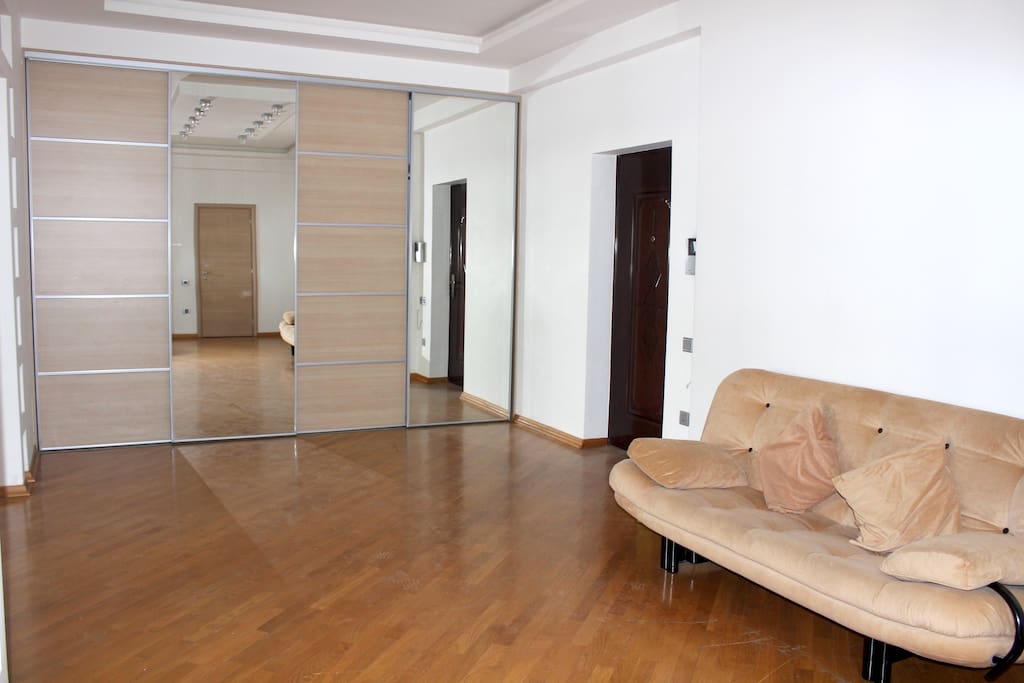 Hall - Entrance door, Big wardrobe and Sofa