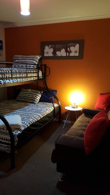 The second bedroom with a tribunk and fold down sofa. Able to accomodate 3 or 4 people or youngsters