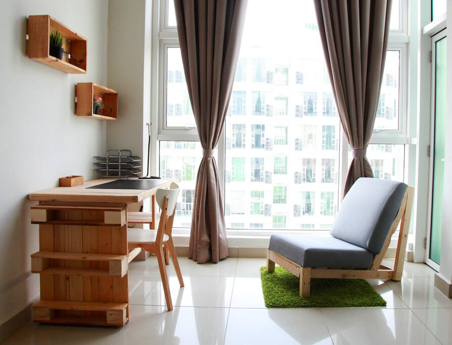 Personal workspace right beside the window with good view.