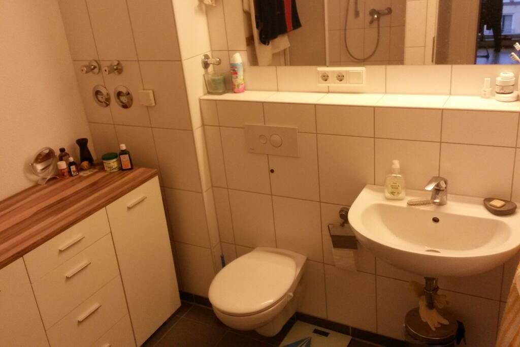 bathroom with shower and bath tub