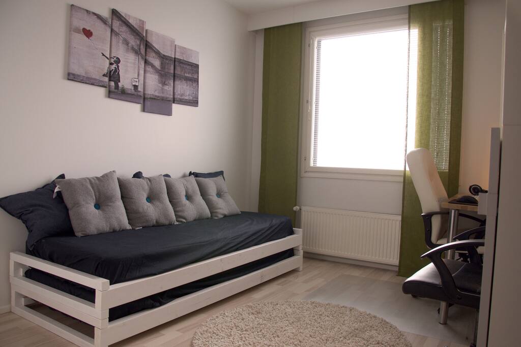 Guest bedroom. The bed has two bed frames with quality spring mattresses.
