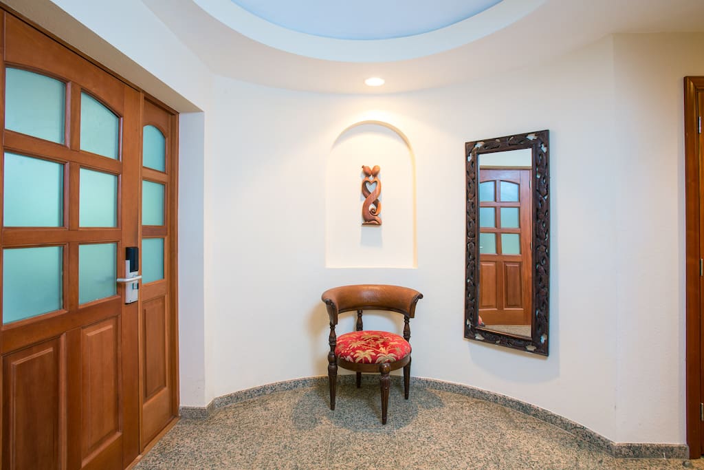 Entrance area, followed by a working space with washer and dryer
