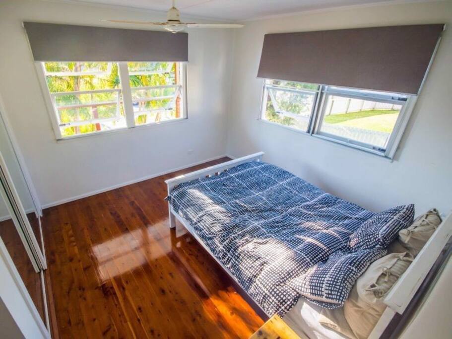 Bright and airy bedroom with queen-sized bed