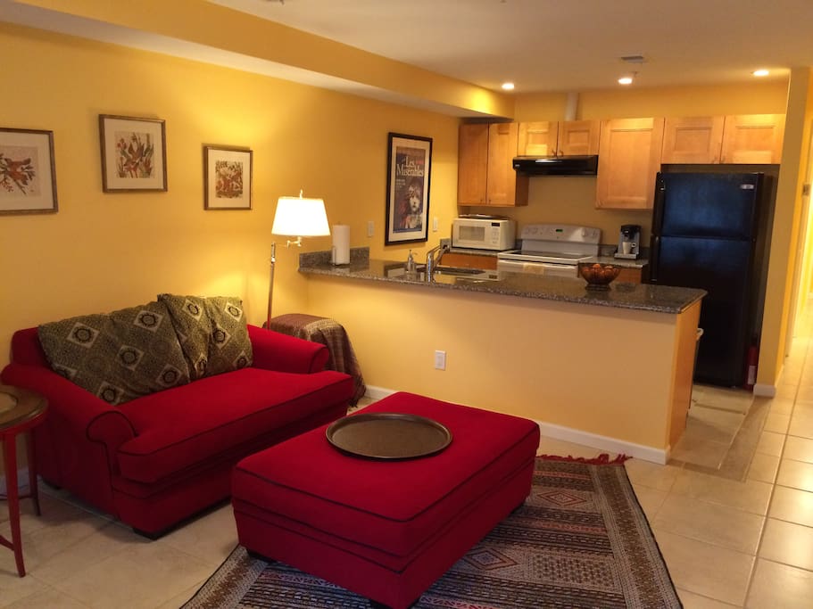 Open floor plan, sitting area facing TV.
