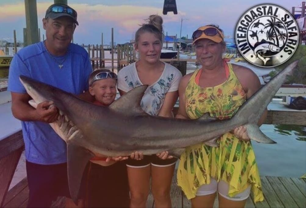 Family Scores A Huge Shark On Their Fishing Trip.