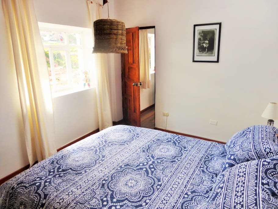 Bright, Cheerful Master Bedroom