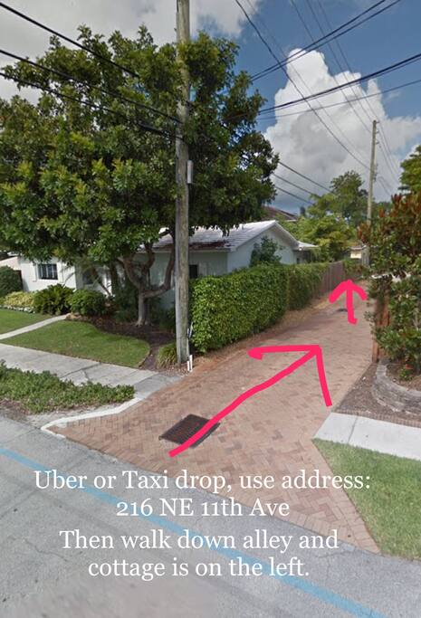 SEPARATE ALLEY RUNNING BEHIND MAIN HOUSE - DO NOT GO TO MAIN HOUSE - FULL TIME RESIDENTS LIVE THERE - COTTAGES ARE IN THE BACK DOWN THIS ROAD BEHIND HOME - PARKING IS SEPARATE FROM MAIN HOME