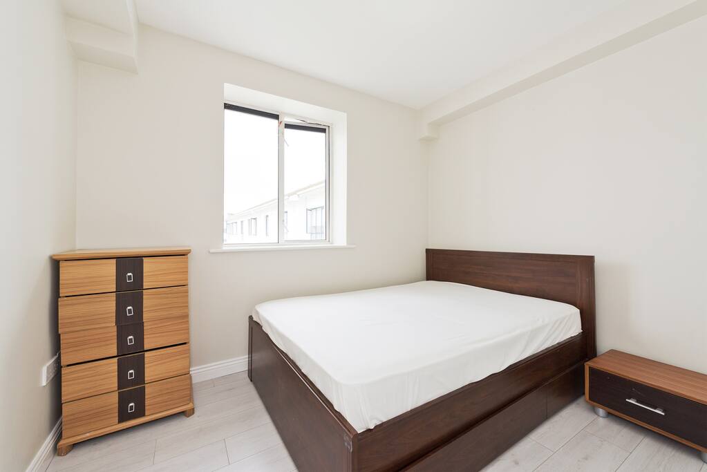 Comfortable double bed with hospitality high standard bedding in a quiet bedroom for a good nights sleep :)