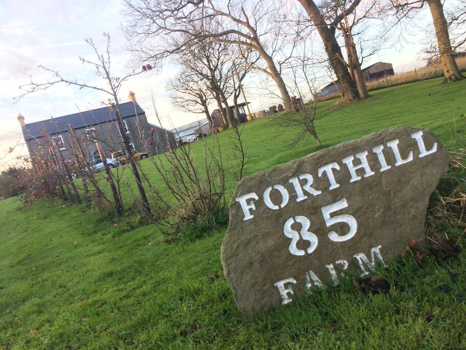 View of the entrance to the farm from the road