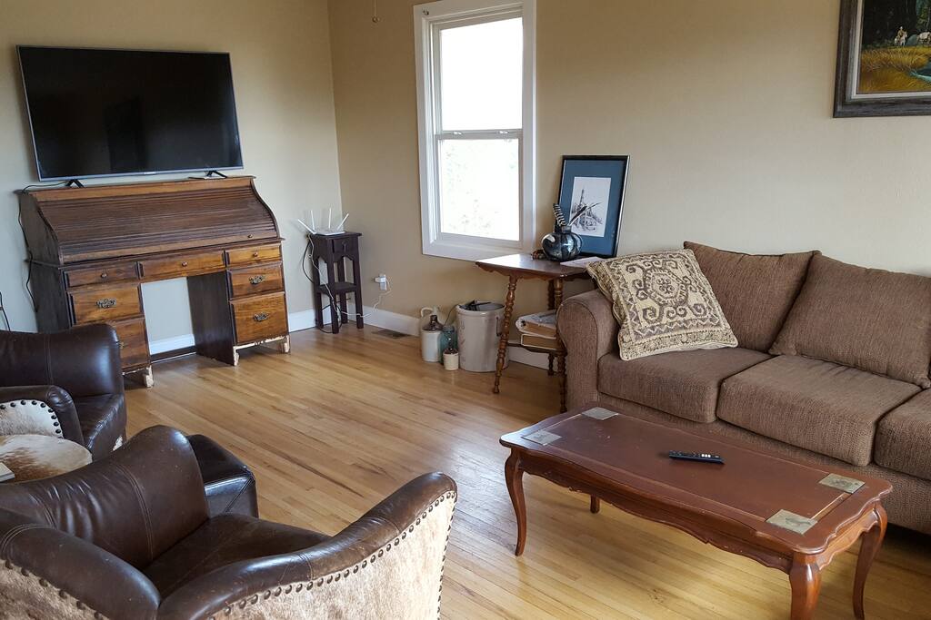 Comfy living room with sectional couch and smart tv