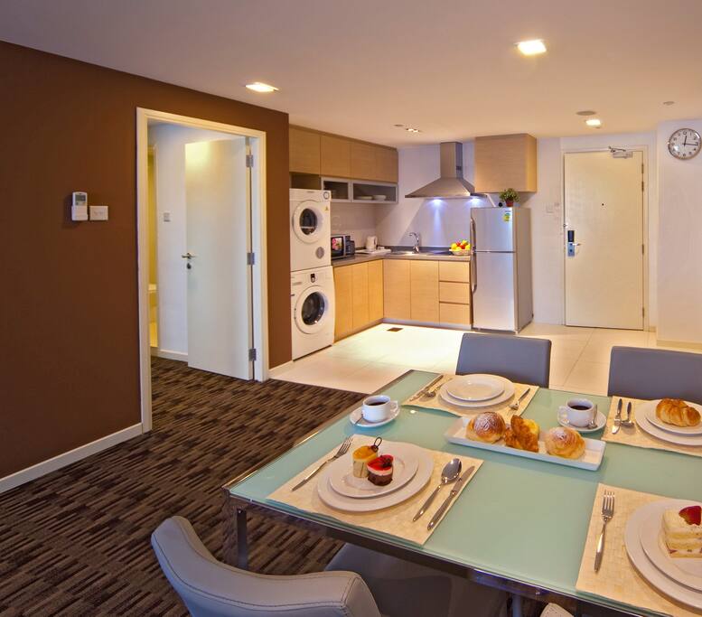 Fully functional kitchenette
Front loading laundry washer & dryer machines