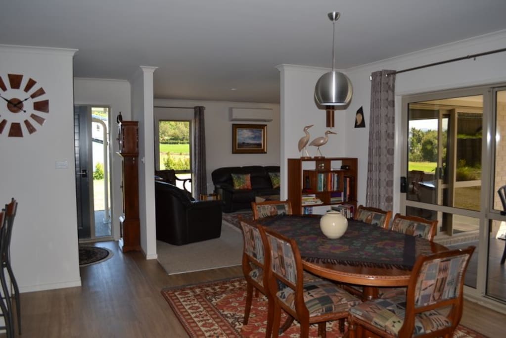 Dining room opening onto the patio in the garden