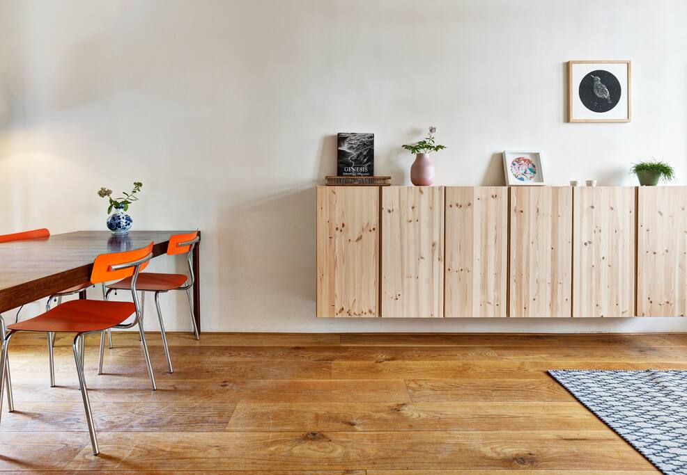 Dining table and wall mounted cupboard
