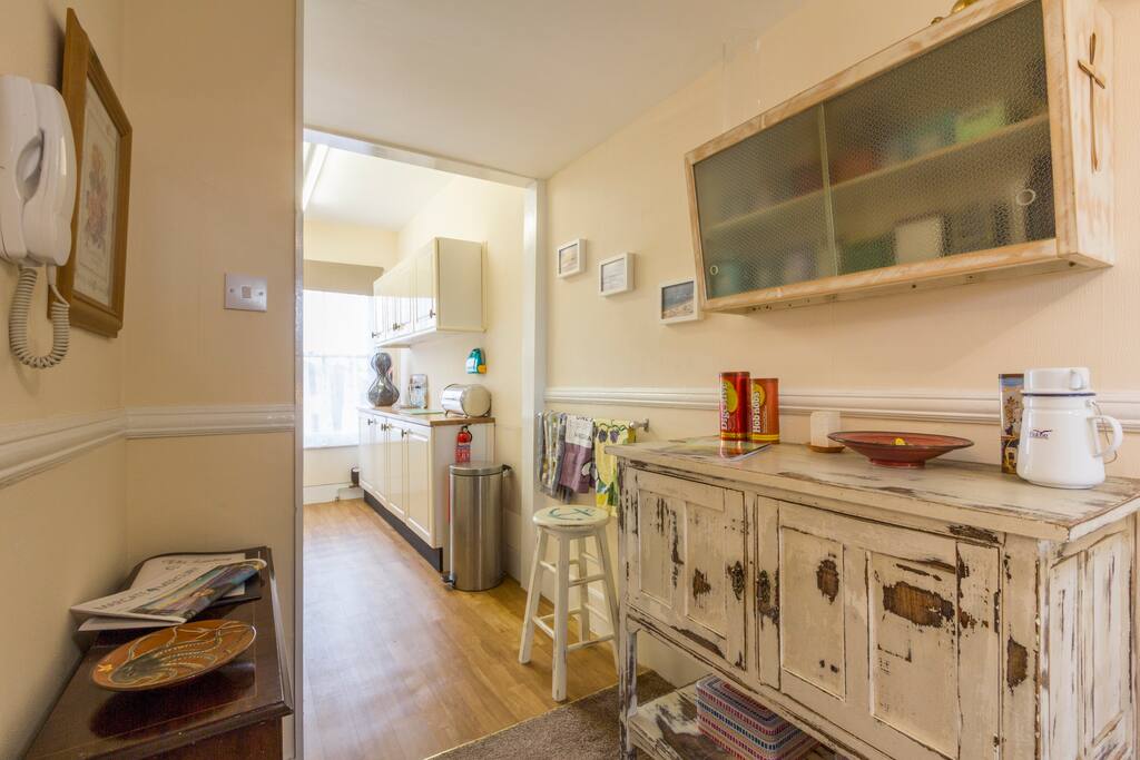 Here is the landing at The Landing. The sideboard and cabinet contain loose leaf teas and bone china for your refreshment.