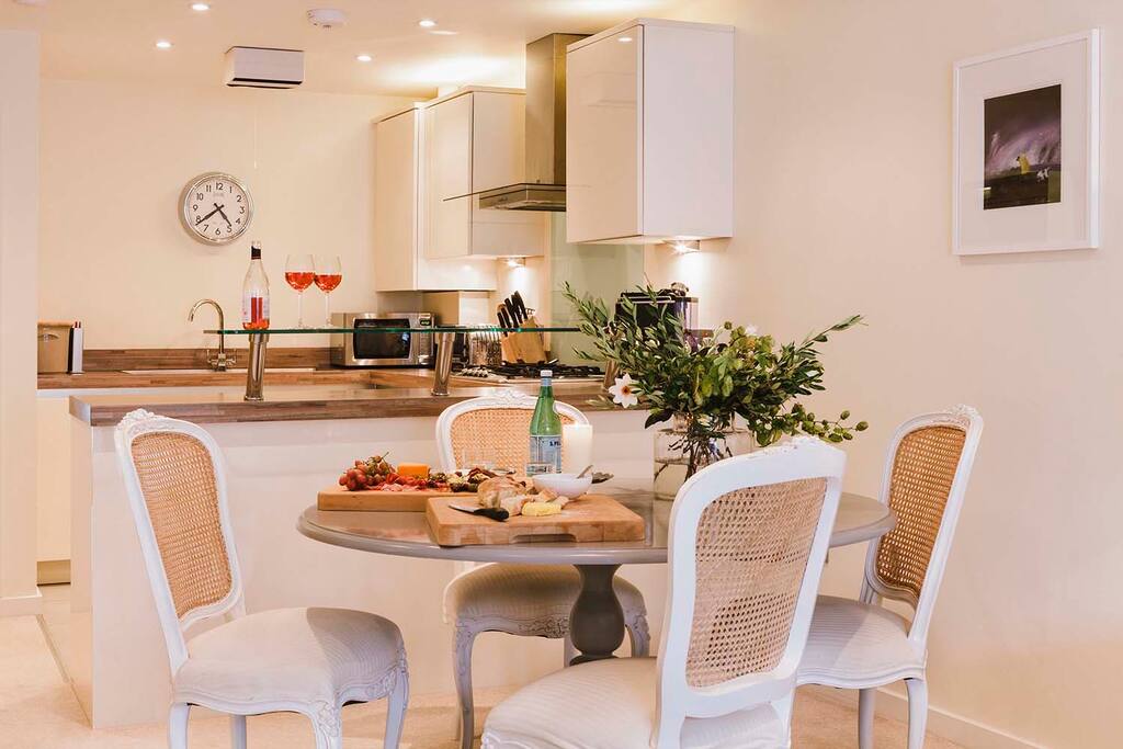 Dining and kitchen area with all the mod cons you may need during your stay