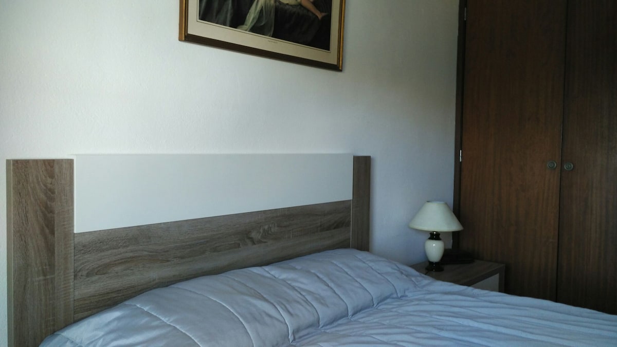 Habitación con balcón