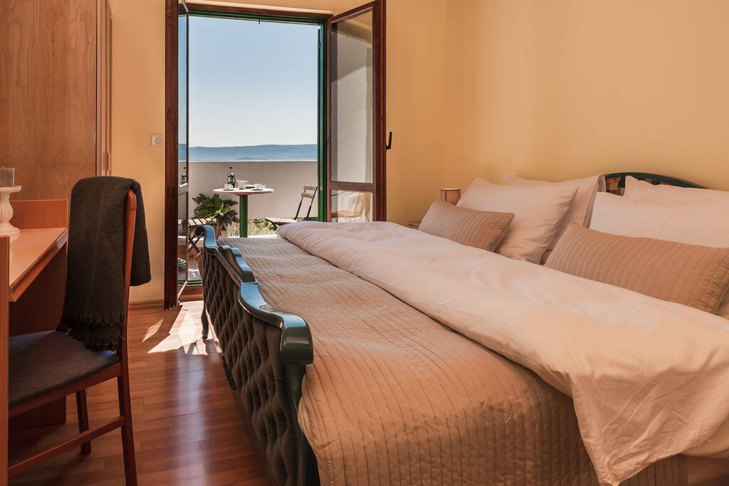bedroom nr. 1 with exit to the private balcony