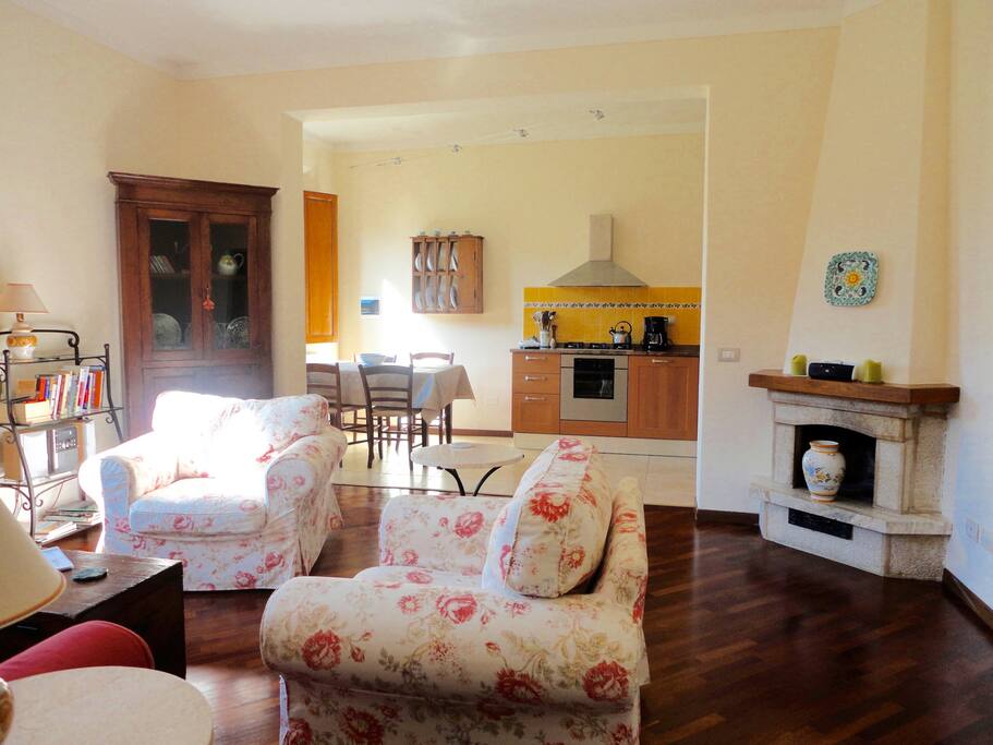 Spacious and open living room, dining and kitchen (as viewed from the large bedroom).