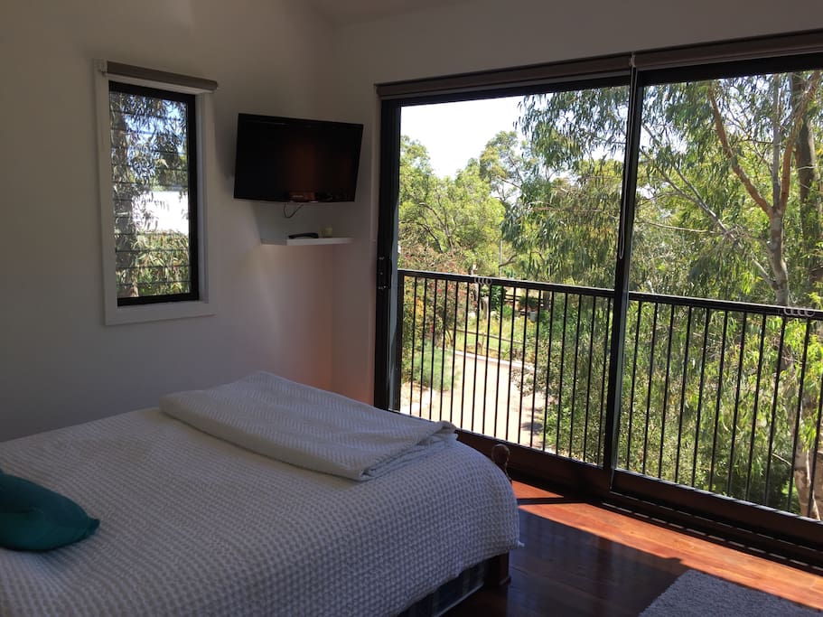 TV viewable from lounge area and bed