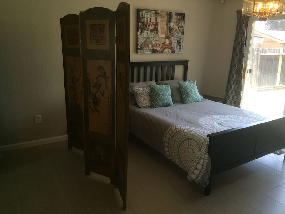 Very comfortable Queen size bed with solid wood bed frame located in the loft area.