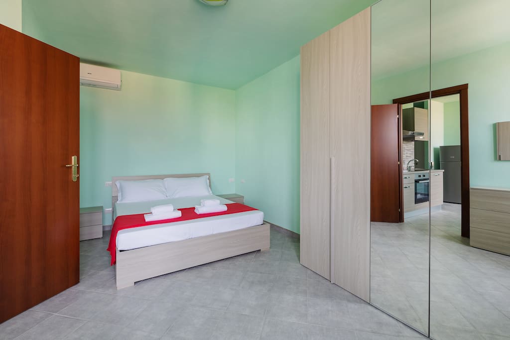 The Bedroom - The comfortable double bed with soft bed-linen and towels