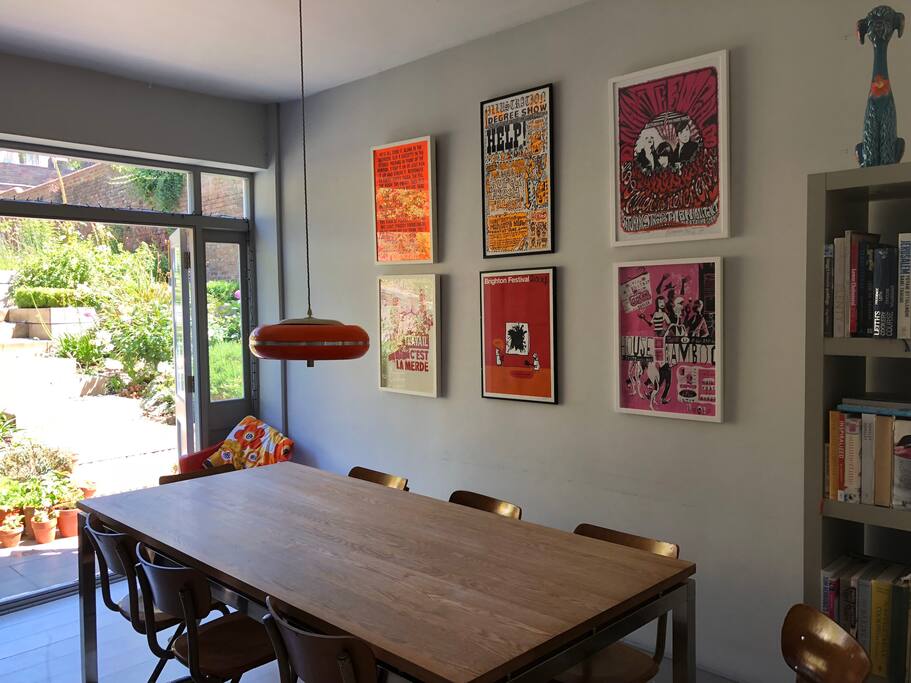 Dining table seats 8 easily. There are extra chairs if needed.