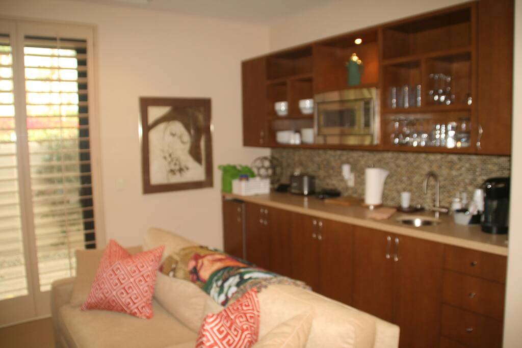 Living Room with Breakfast Bar, small refrigerator,toaster oven and one burner electric stove
