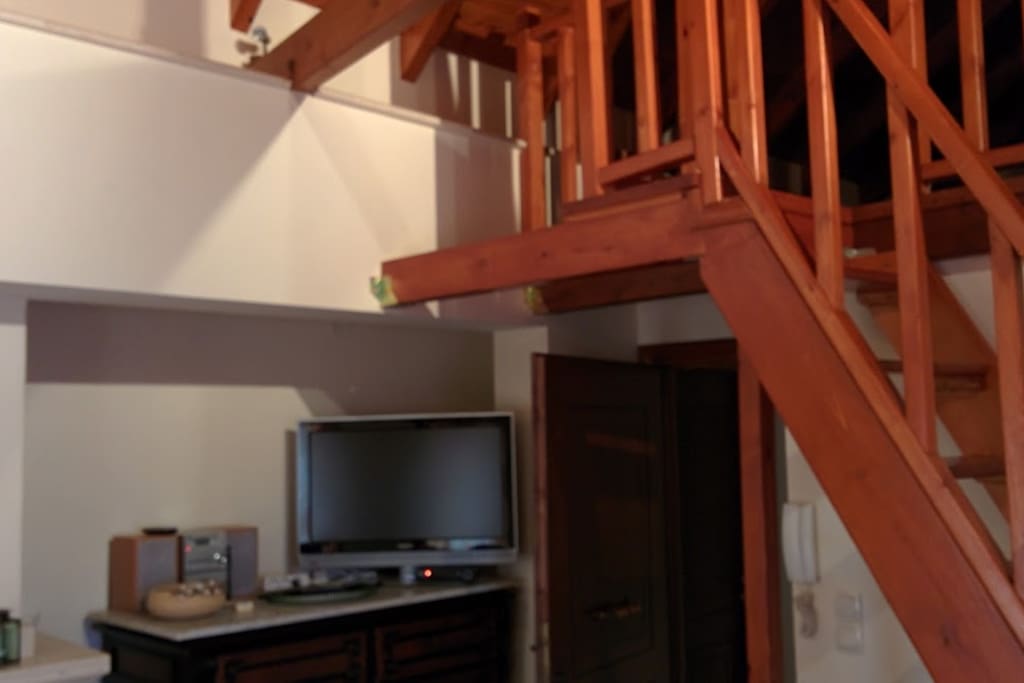 The entrance and the stairs to the main bedroom (attic)