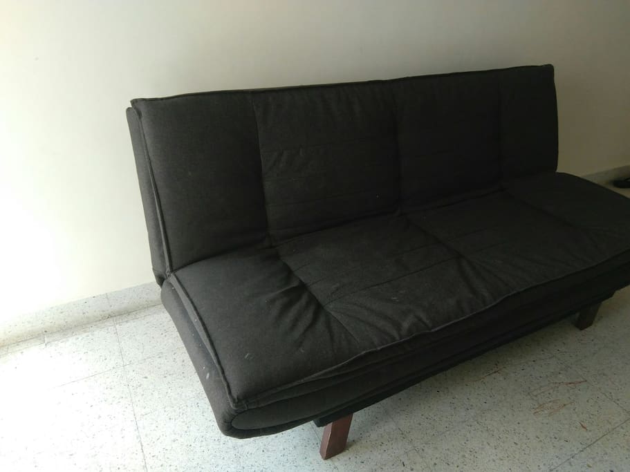 sofa cum bed, opens to a fully flat bed. comfortable for one, cosy for two ;)