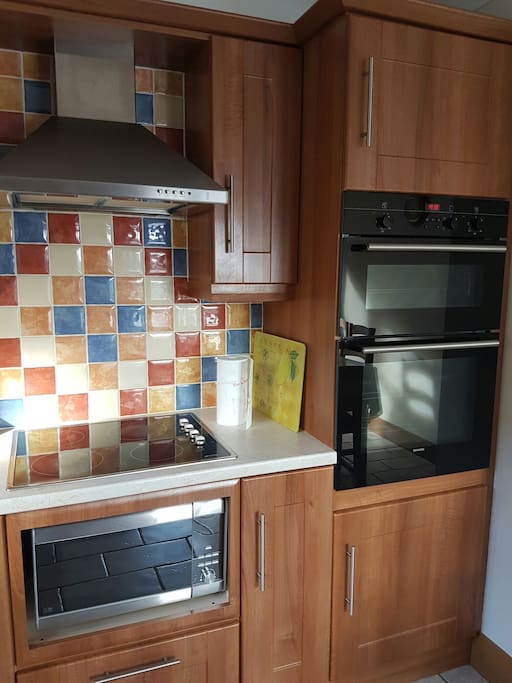 Hob, oven and microwave