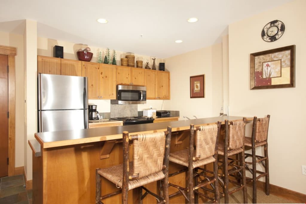 Cook meals in the fully-equipped kitchen, complete with stainless steel appliances