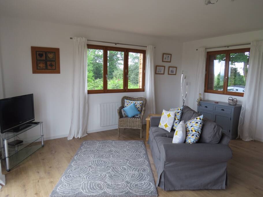 Lounge area with bi-fold doors onto balcony