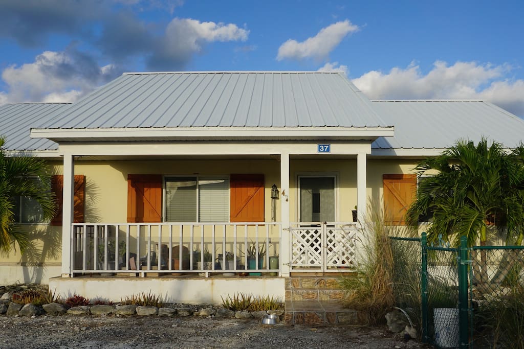 Front of house compete with vegetation