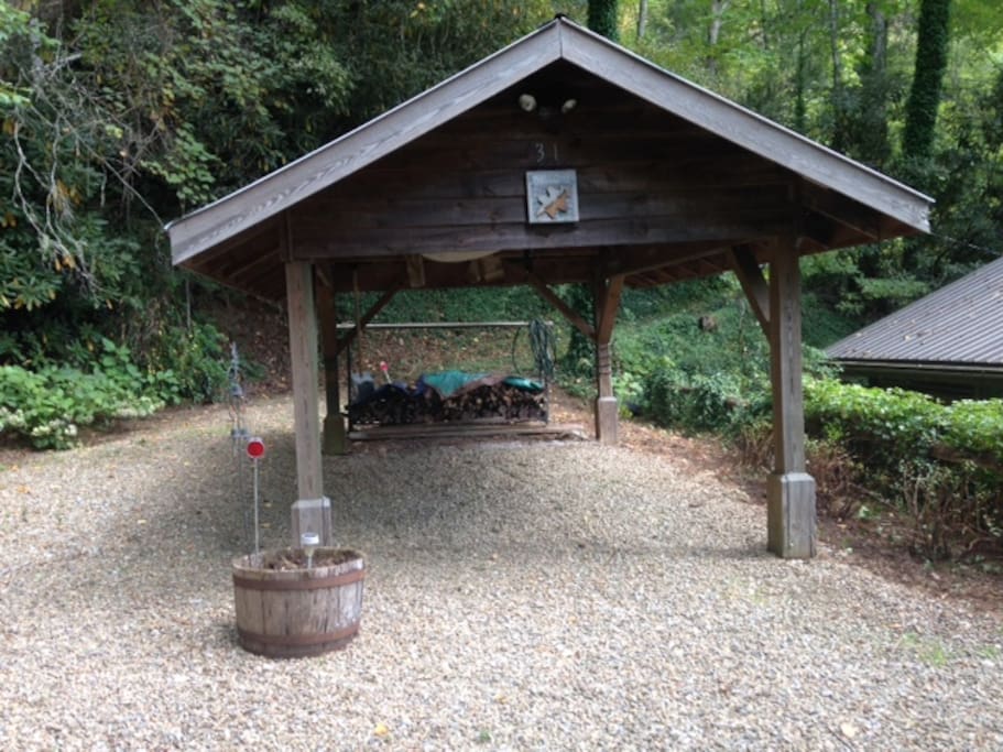 Carport and woodpile