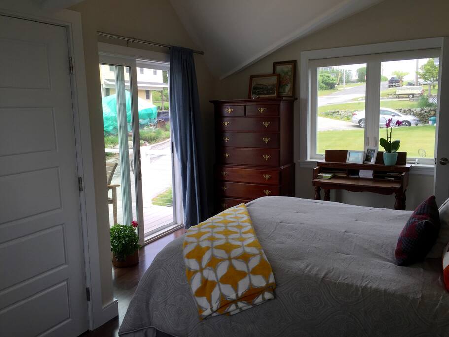 Your master bedroom with queen bed, closet and on-suite bath, along with sliders out to a private deck.