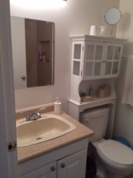 Bathroom with tub and shower