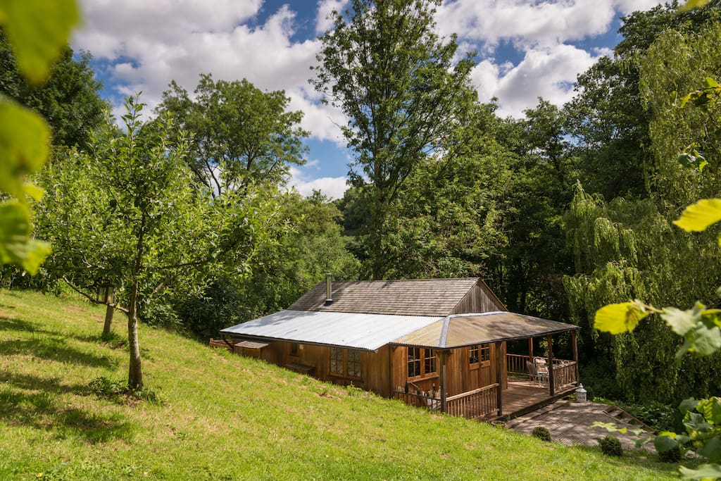 Tea Pavilion nestled between the orchard and the brook