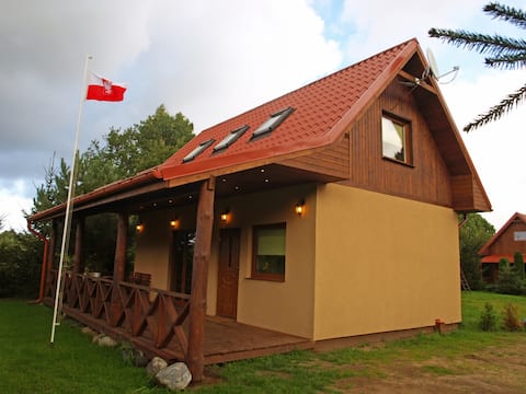 Year-round house with a hot tub in Kopalino