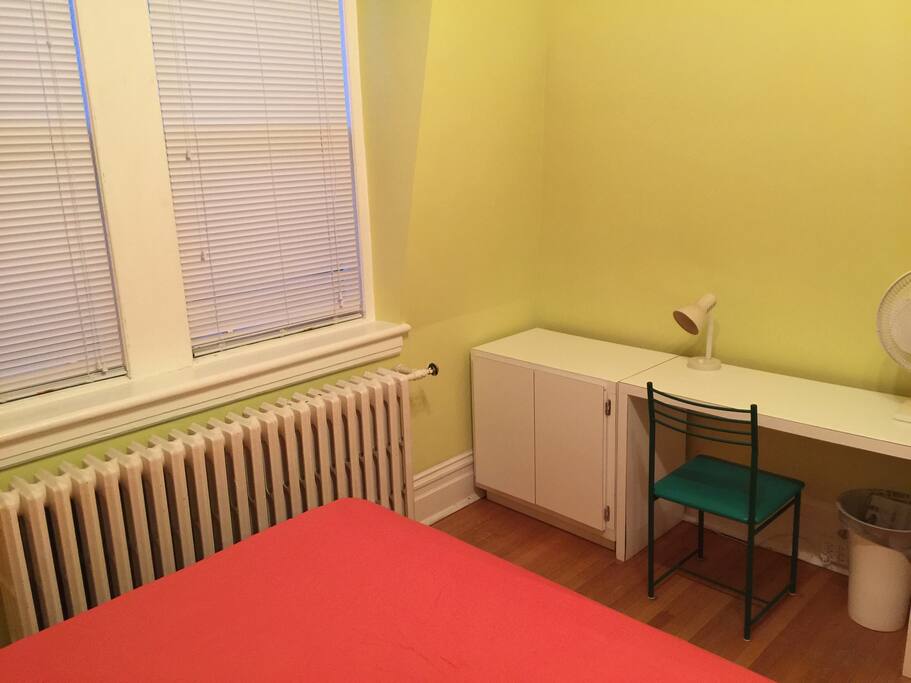 A desk and chair are provided for your laptop use.