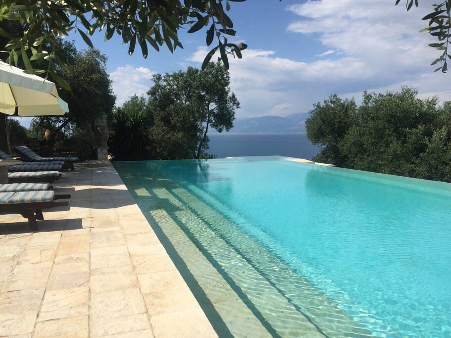 Glorious infinity pool overlooking the Ionian Sea towards Albania