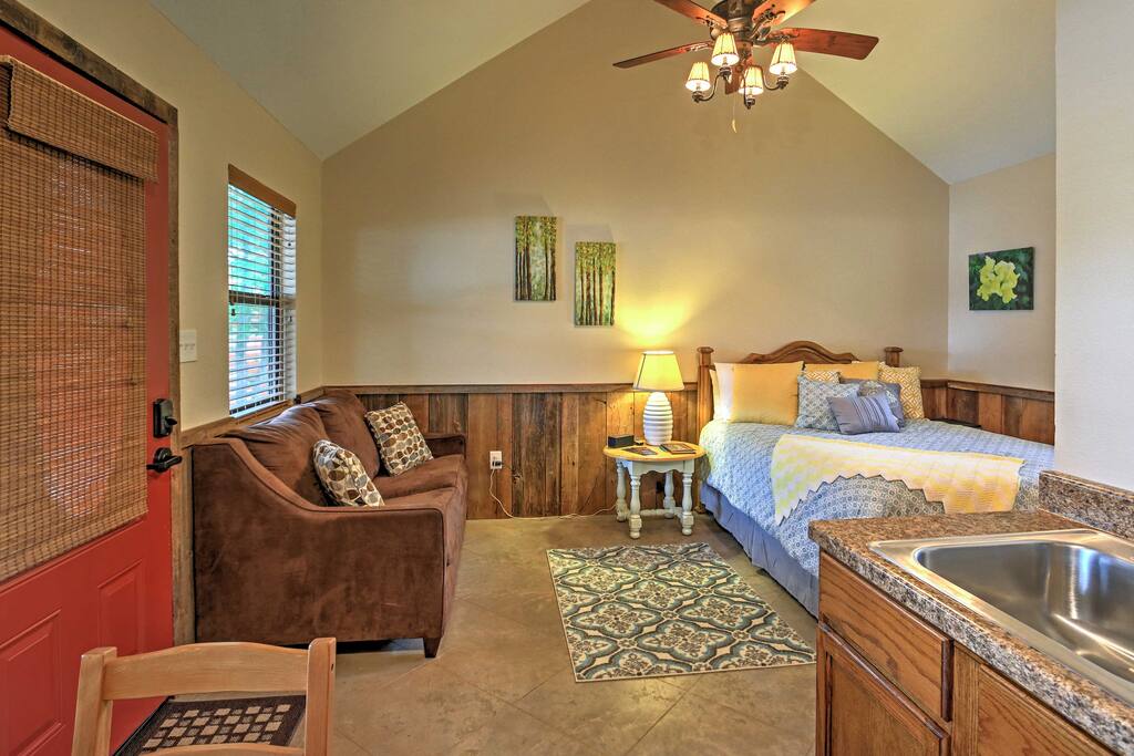 Step inside the cabin and enter the studio-efficiency living space, which features a queen, sized bed, comfortable pullout soft and a well equipped kitchenette.