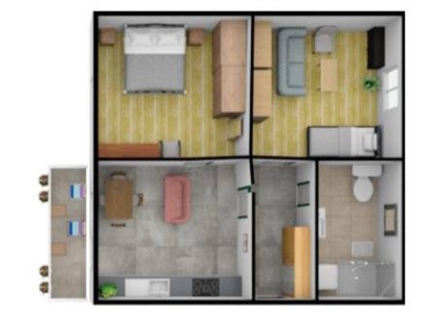 Floor plan. Big kitchen with a table and a sofa. Bedroom 1 with double bed, wardrobe and bedroom 2 with pull out bed (two single beds), extendable sofa and tv. Bathroom has a shower and a washing machine. Balcony has a view to garden and mountains.