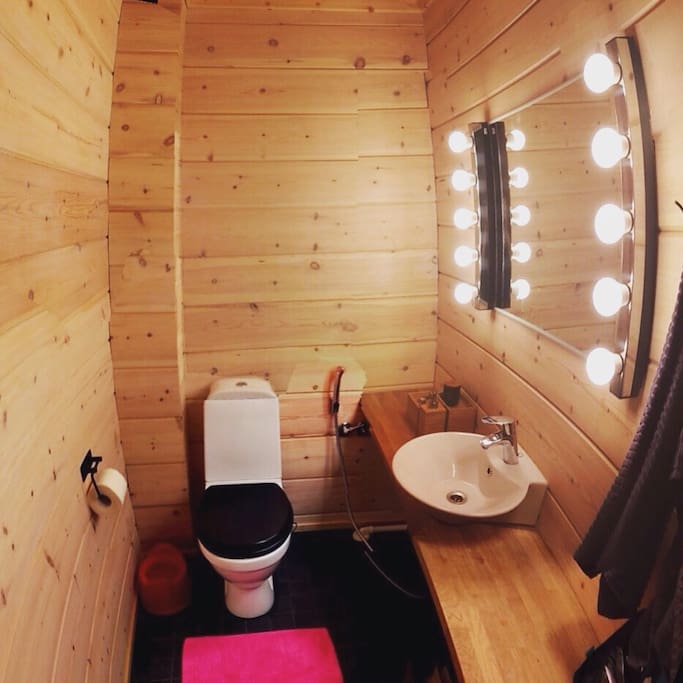 Bathroom equipped with children's potty. Hand soap is provided.