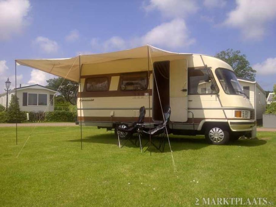 It has an extension canvas thsi was before the camper was painted the colour is now different