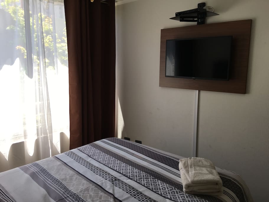 Dormitorio con TV por Cable.