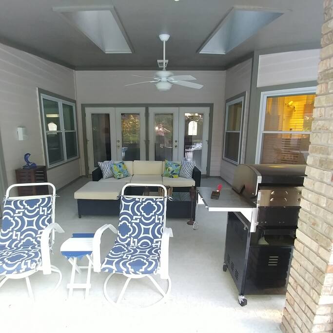 Covered outside patio with grill.