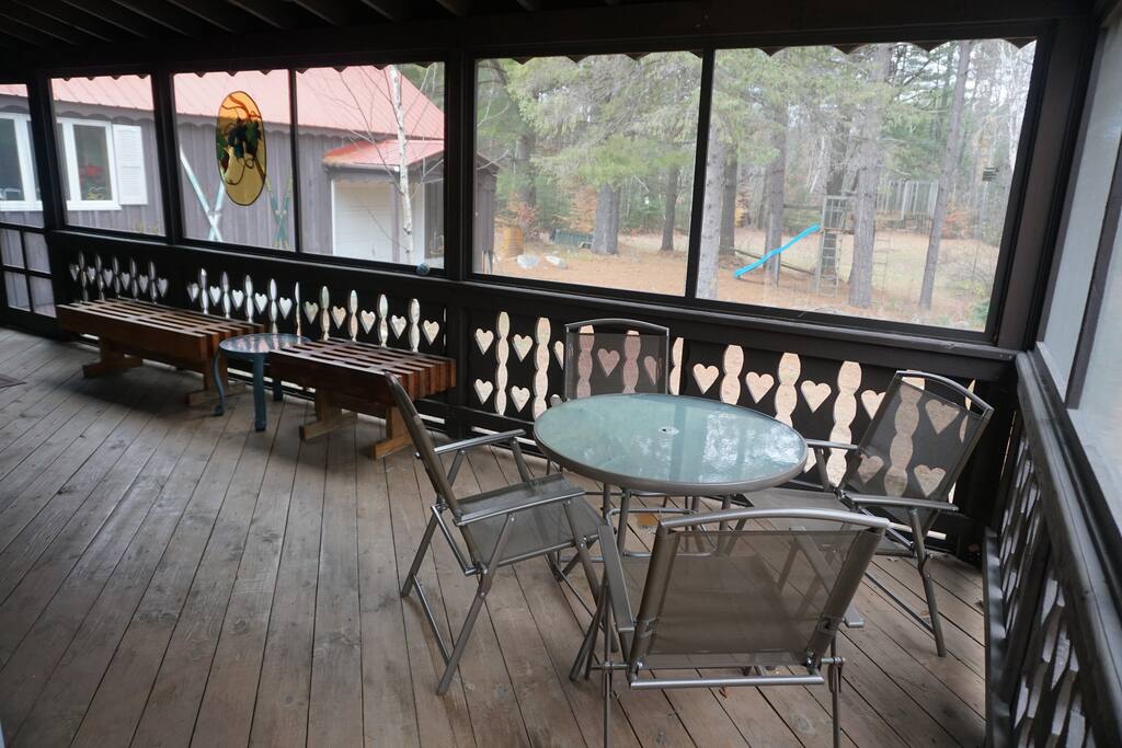 SCREENED IN HOT TUB ROOM OVERLOOKING THE PEACEFUL 3 ACRES. THE JUNGLE GYM FOR THE KIDS TO BE KIDS.