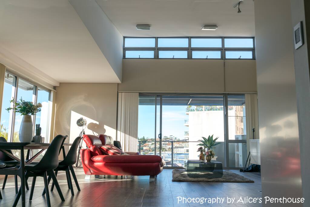 The huge luxury living room with a loft style