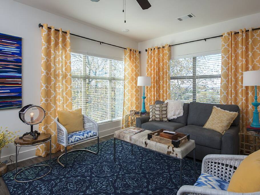 Queen sleeper sofa, flat screen TV, this living space leads to a balcony